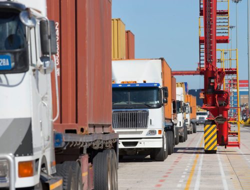 trucks-transporting-cargos-from-a-dockyard-2026-03-26-09-06-51-utc